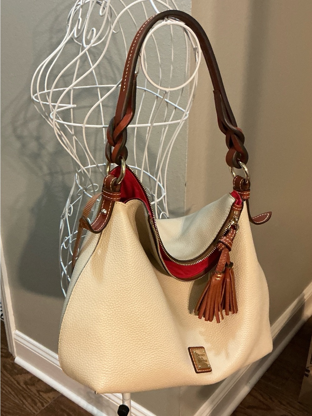 Dooney & Bourke Cream Leather Shoulder Bag with Brown Trim and Red Lining